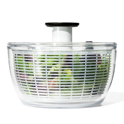 Clear OXO Good Grips salad spinner with a white pump lid